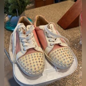Pink Louboutin sneakers